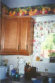 Kitchen_lt_cupboard.jpg (42713 bytes)
